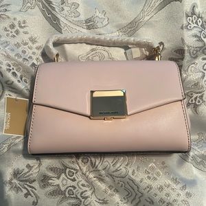 Michael Kors powder blush cross body hand bag & matching wallet. Selling as set